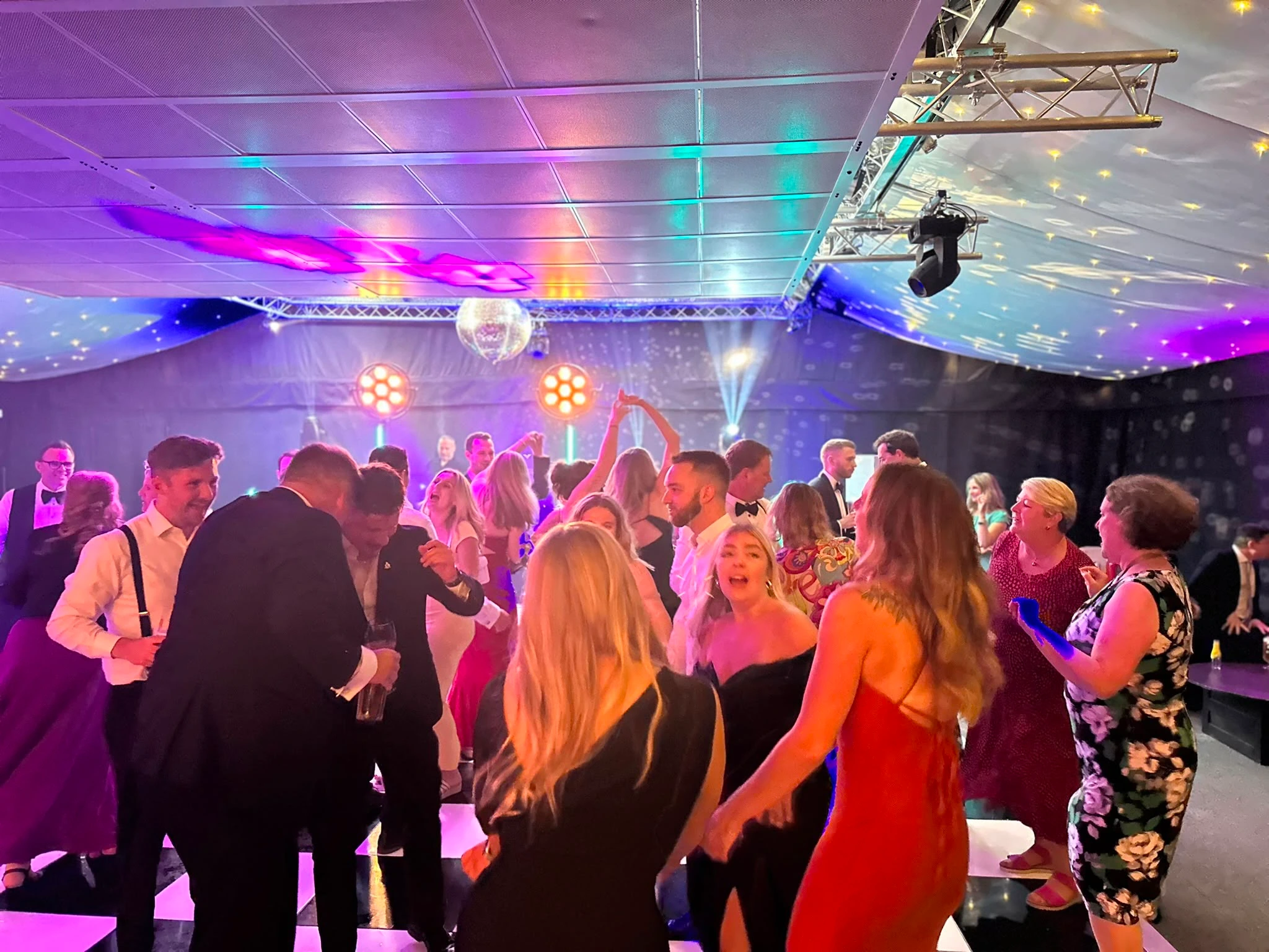 A marquee floor filling after dinner