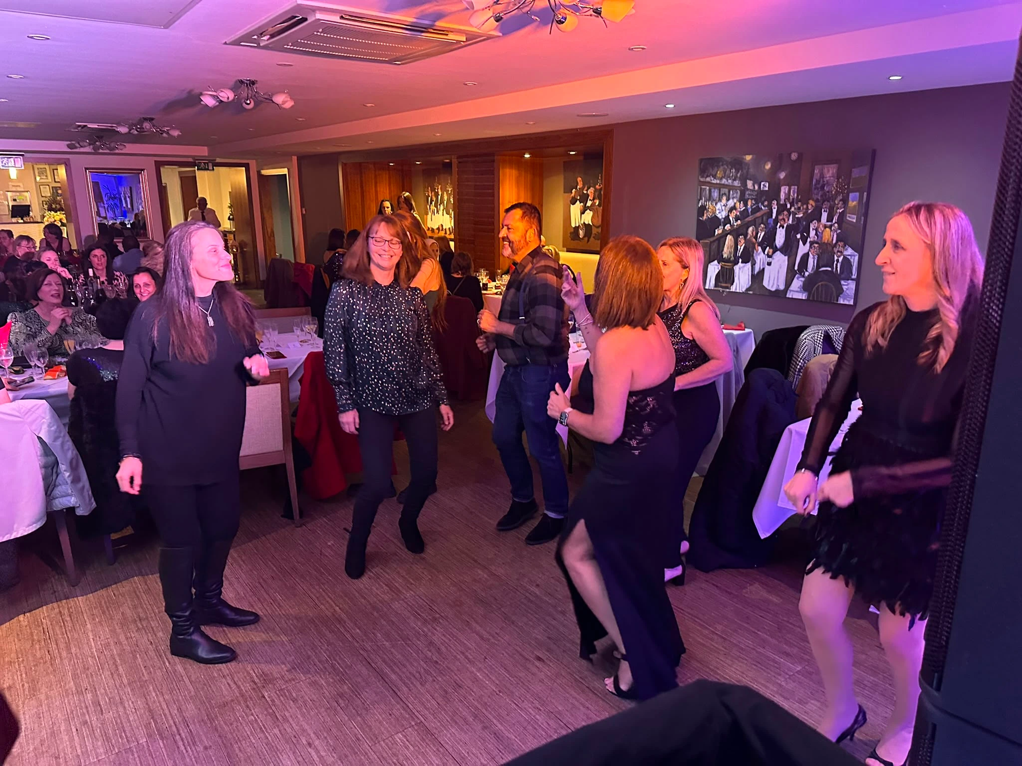 Guests dancing between the tables