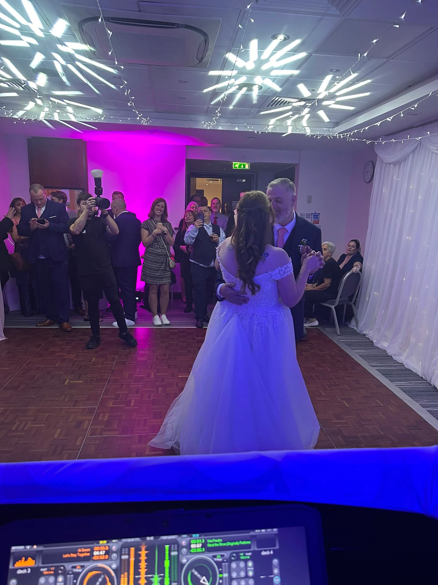 First dance framed by star projections across the ceiling