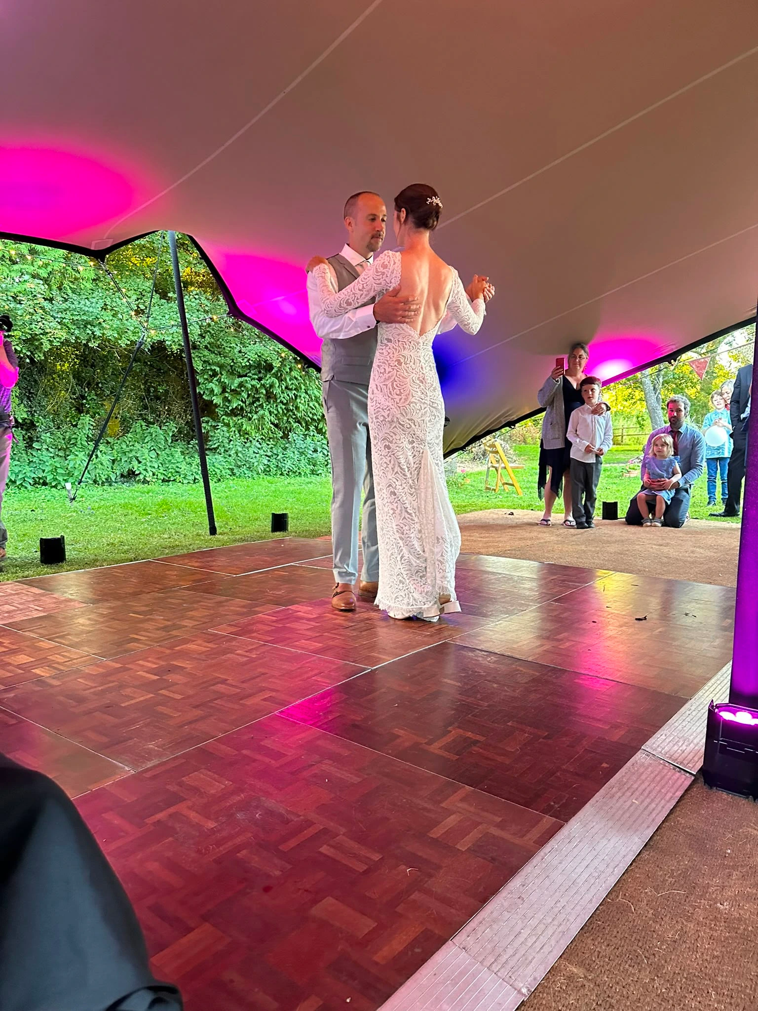 First dance under a stretch tent with the garden behind