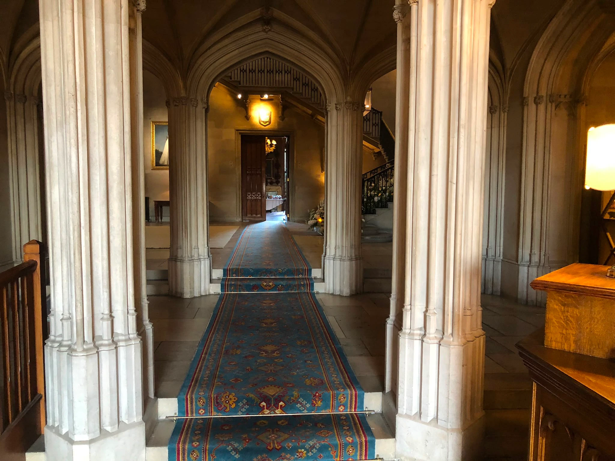 Stone cloister corridor leading into the reception