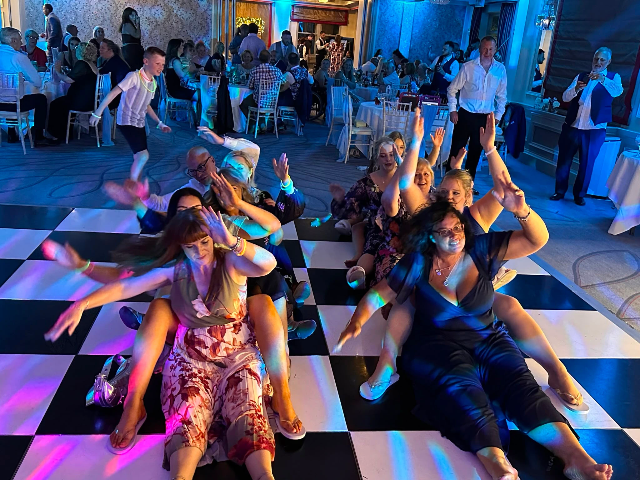 The rowing-boat routine on a black and white checkerboard floor