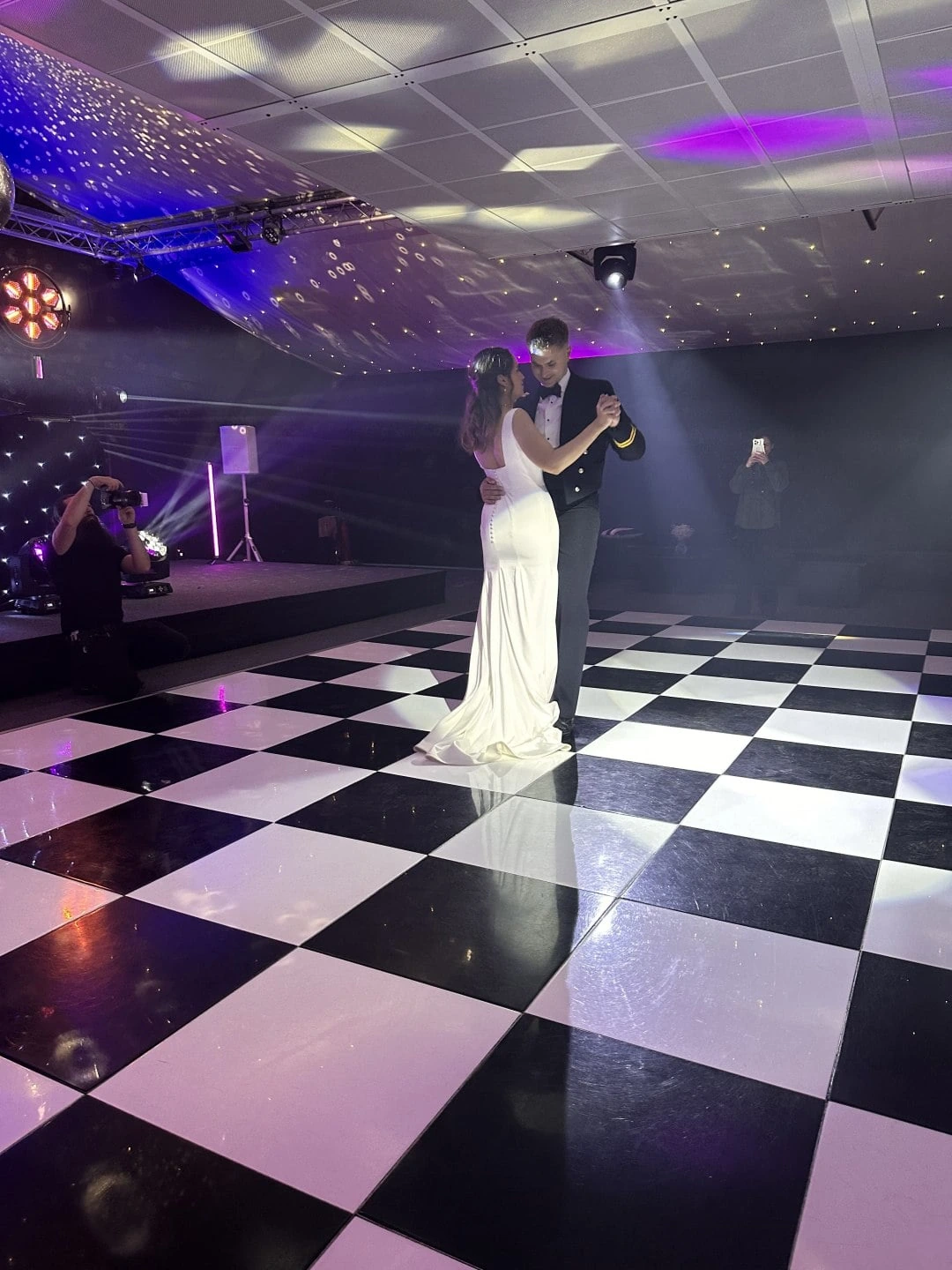 First dance on a black and white checkerboard floor