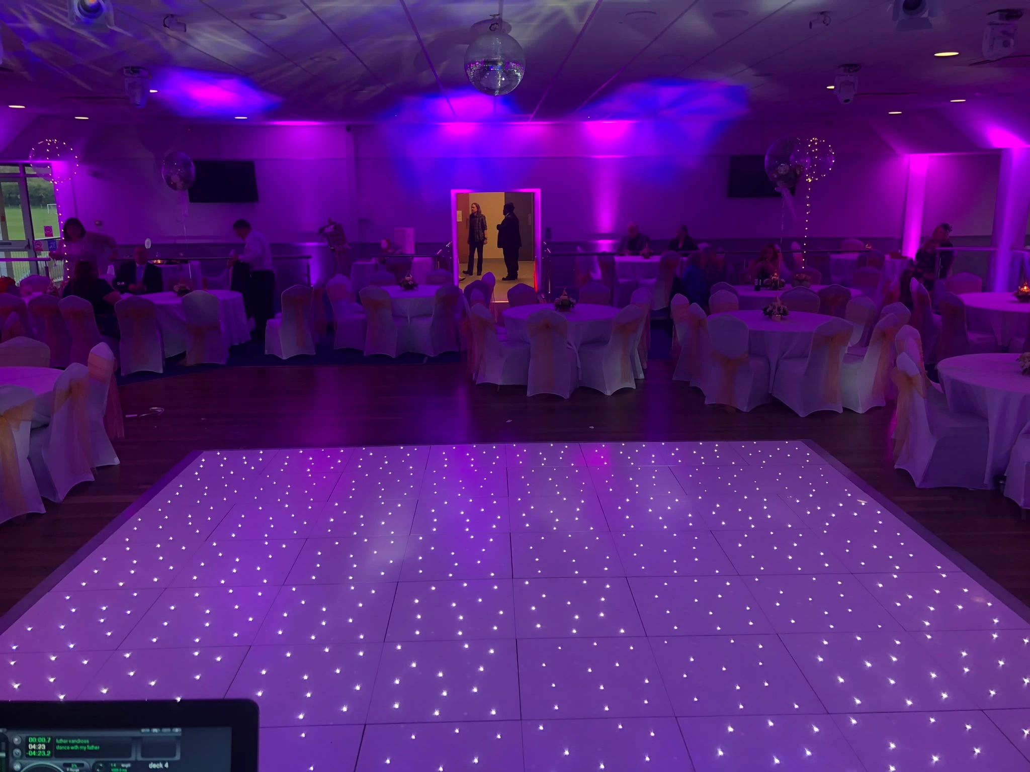 White starlit dance floor waiting for the first track