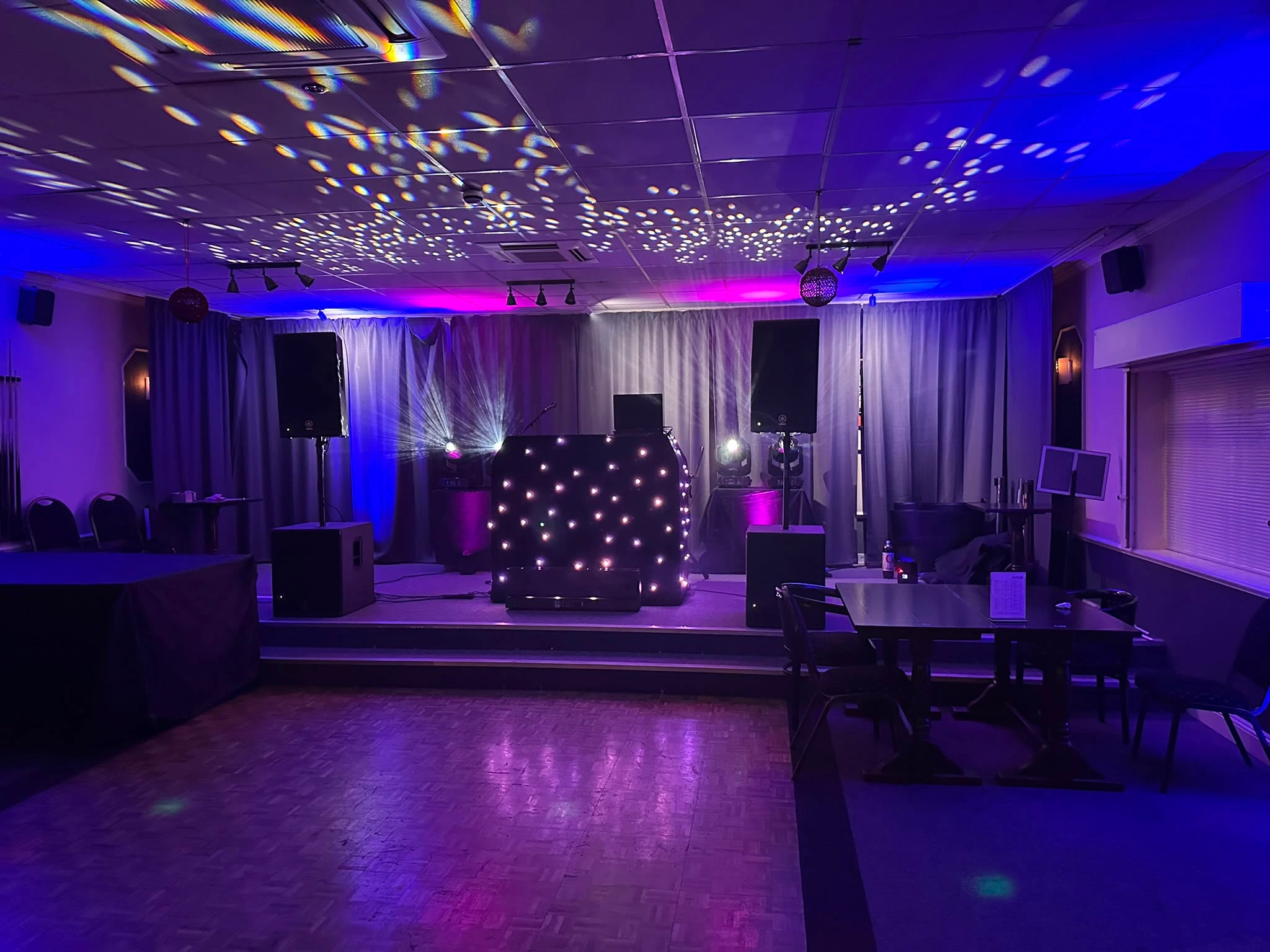 Star booth and gobo patterns in a darkened room