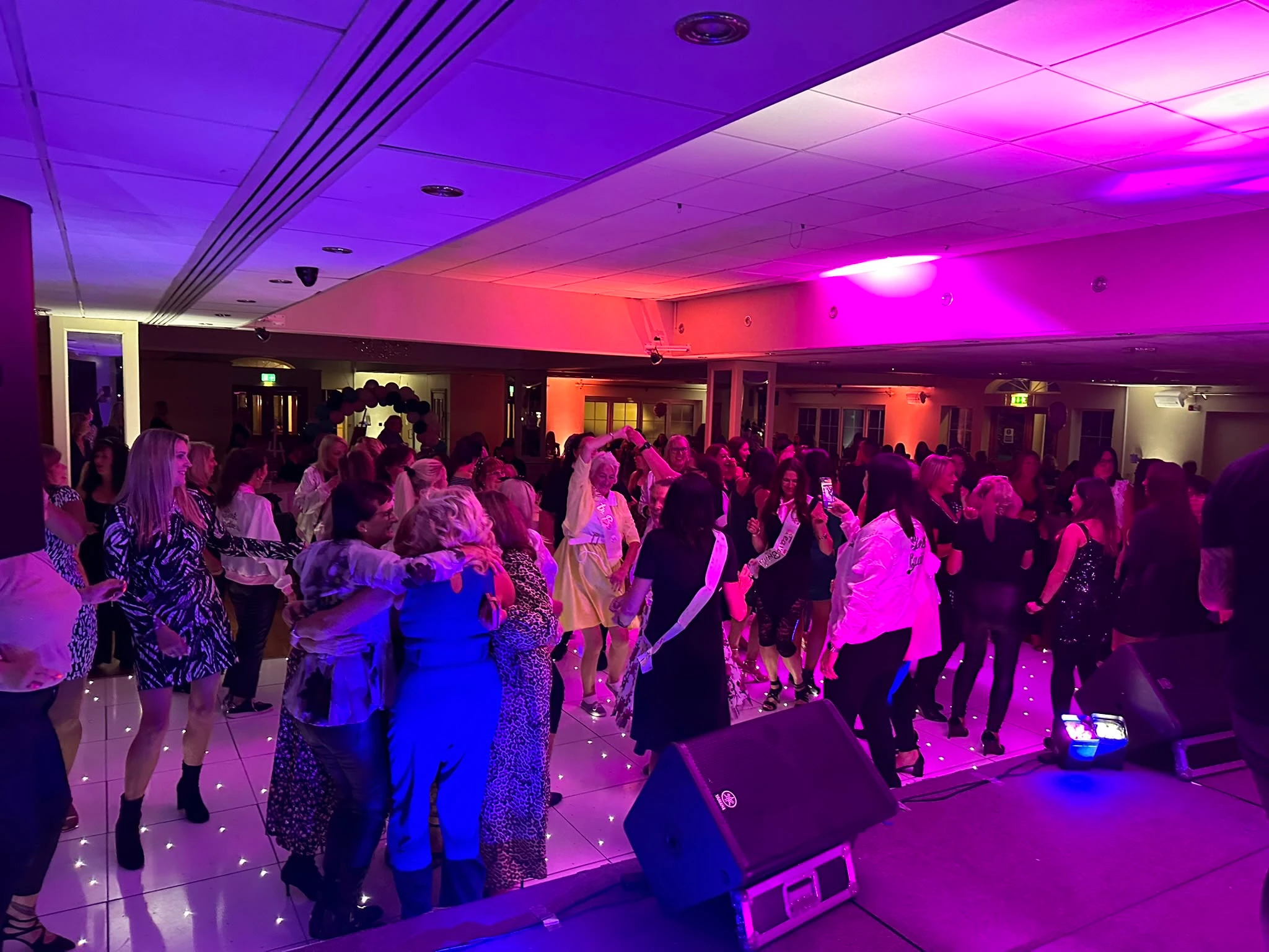 A white LED dance floor filled edge to edge